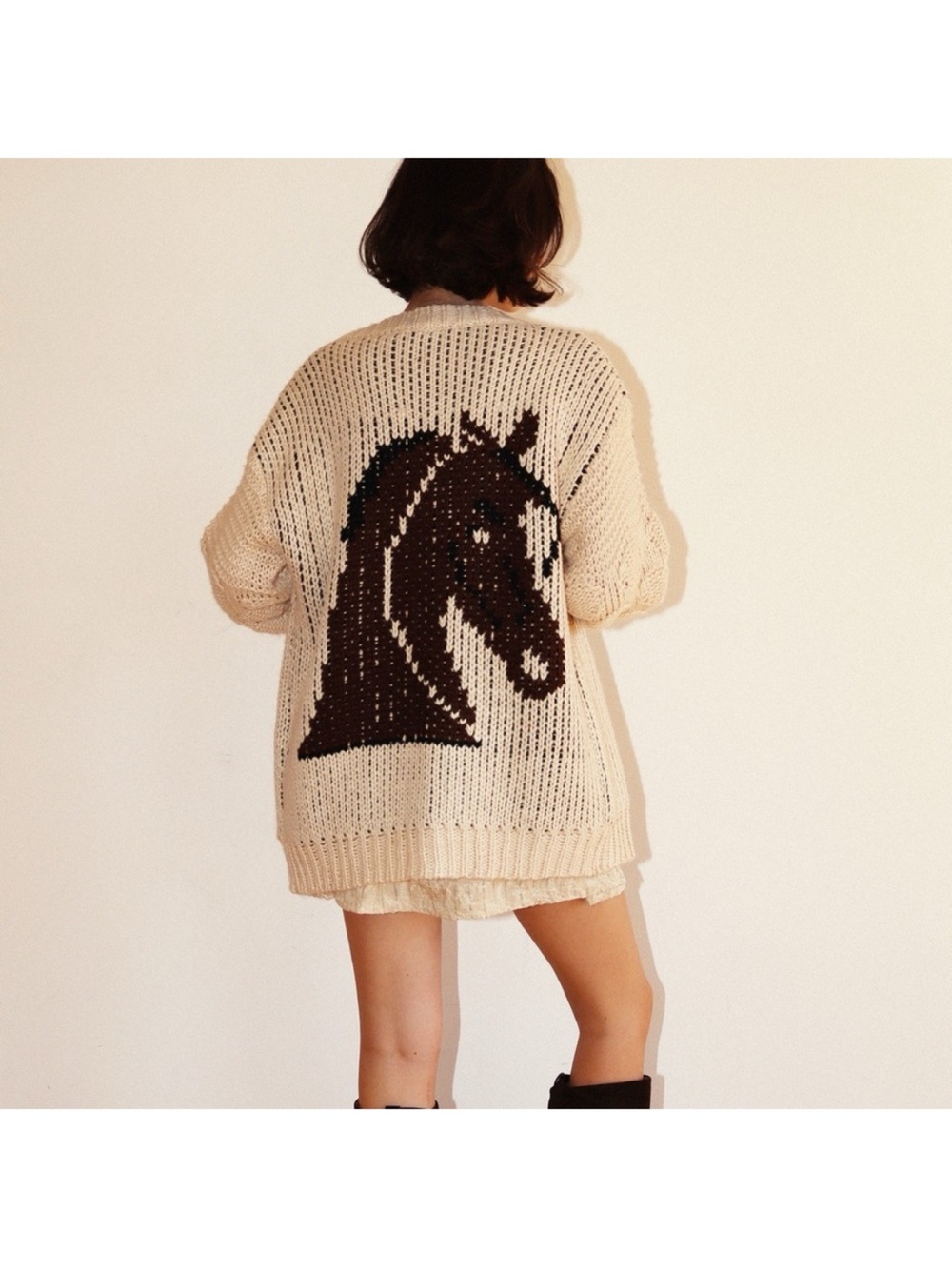 REVOLVE Cream Open-Knit Cardigan with Black Horse Motif